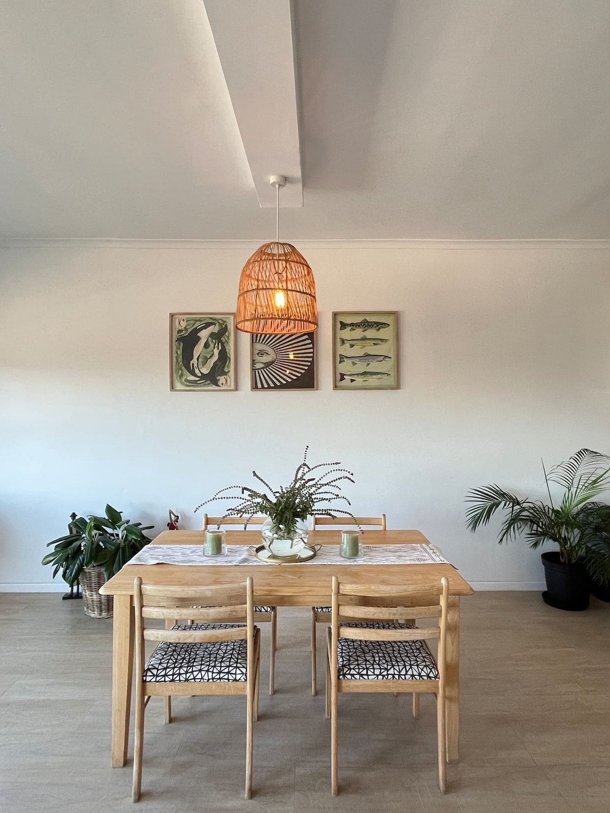 Dining area at Atlantic Apartment with a wooden table seating four